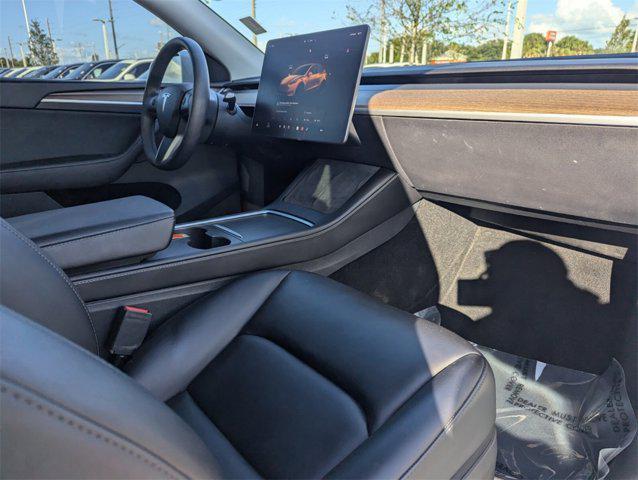 used 2024 Tesla Model Y car, priced at $32,991