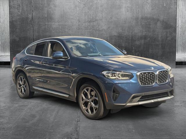 used 2022 BMW X4 car, priced at $37,299