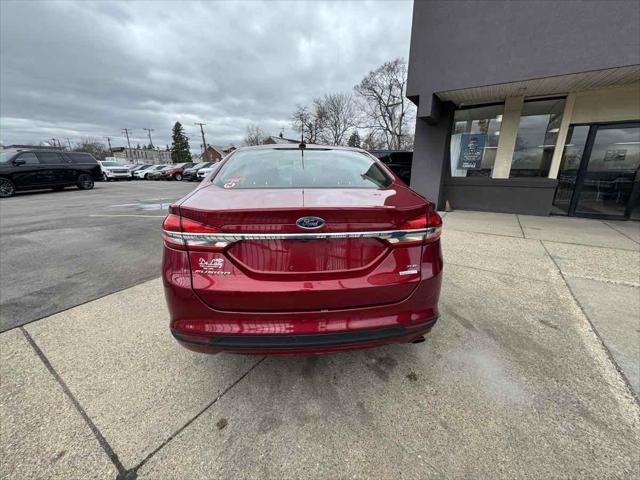 used 2018 Ford Fusion car, priced at $10,905