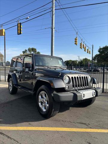 used 2014 Jeep Wrangler Unlimited car, priced at $17,405