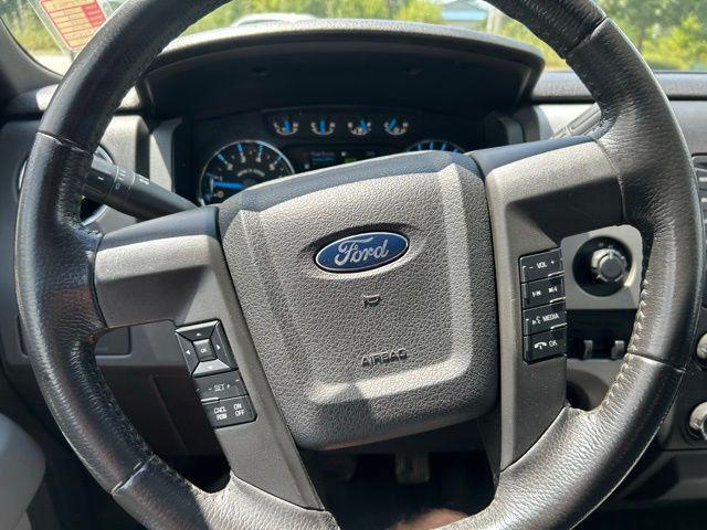 used 2014 Ford F-150 car, priced at $15,000