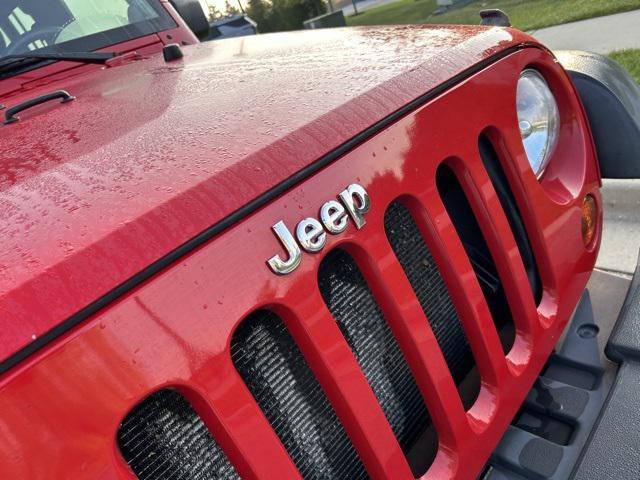 used 2011 Jeep Wrangler Unlimited car, priced at $13,844