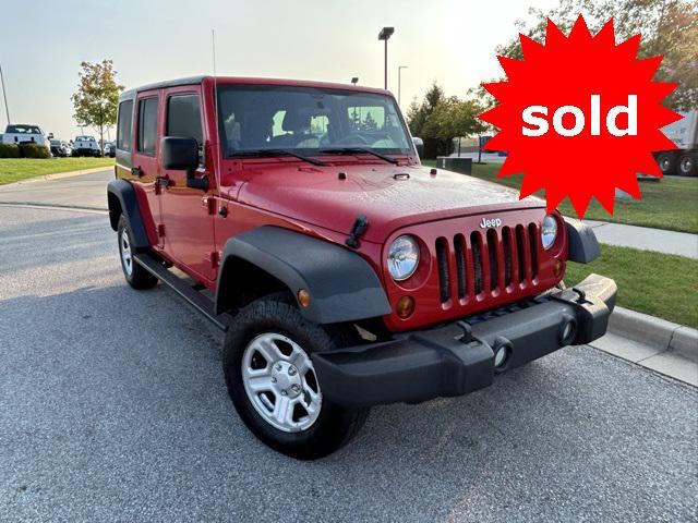 used 2011 Jeep Wrangler Unlimited car, priced at $13,844