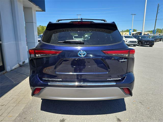 used 2021 Toyota Highlander Hybrid car, priced at $32,885