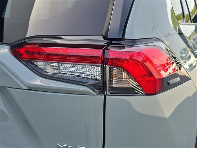 used 2023 Toyota RAV4 car, priced at $33,876