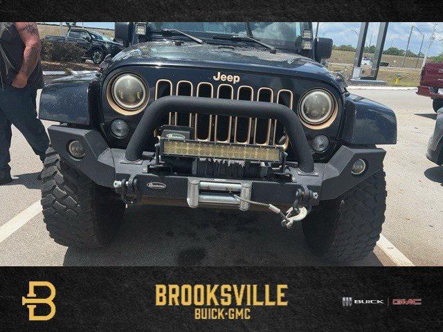 used 2014 Jeep Wrangler Unlimited car, priced at $11,477
