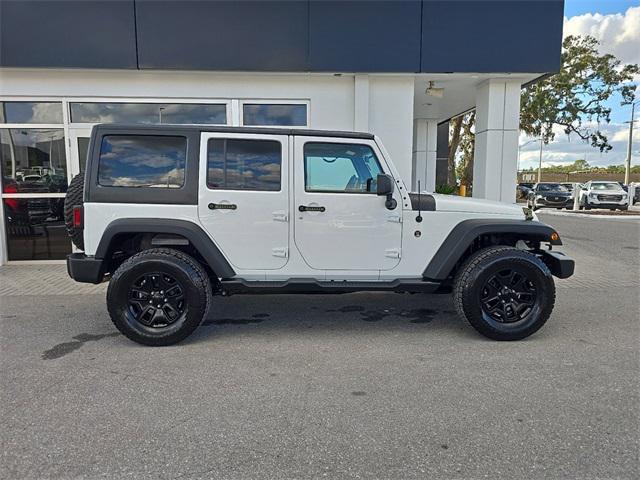 used 2017 Jeep Wrangler Unlimited car, priced at $17,672