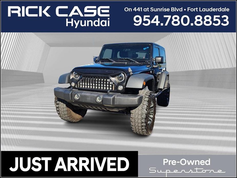 used 2015 Jeep Wrangler car, priced at $15,999