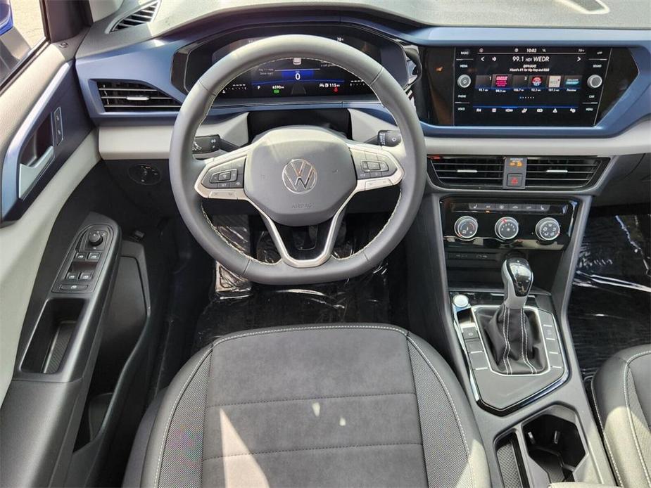 used 2023 Volkswagen Taos car, priced at $24,670
