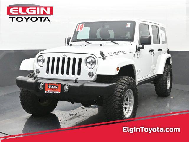 used 2014 Jeep Wrangler Unlimited car, priced at $22,990