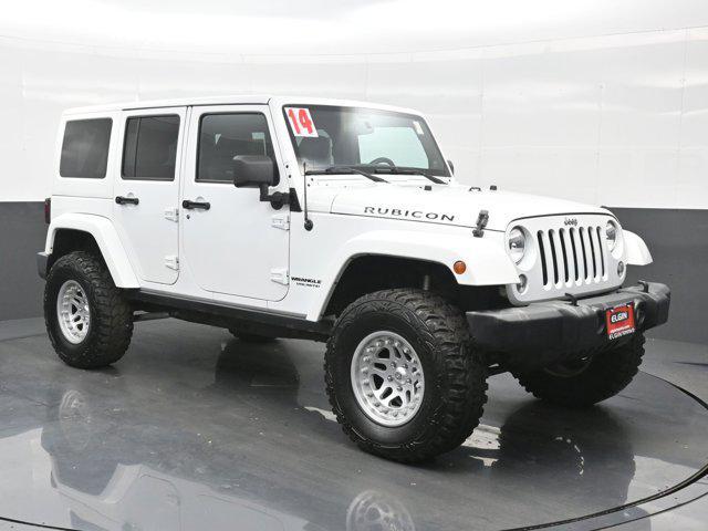 used 2014 Jeep Wrangler Unlimited car, priced at $22,990