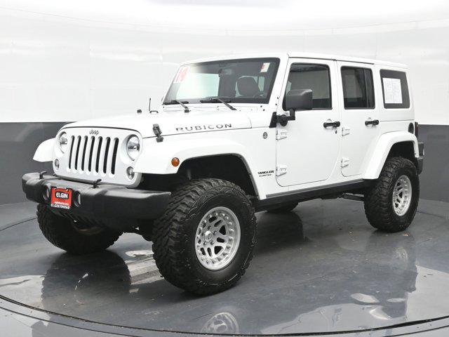 used 2014 Jeep Wrangler Unlimited car, priced at $22,990