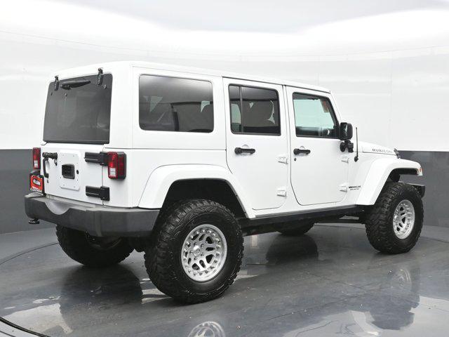 used 2014 Jeep Wrangler Unlimited car, priced at $22,990