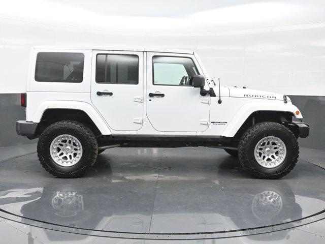 used 2014 Jeep Wrangler Unlimited car, priced at $22,990