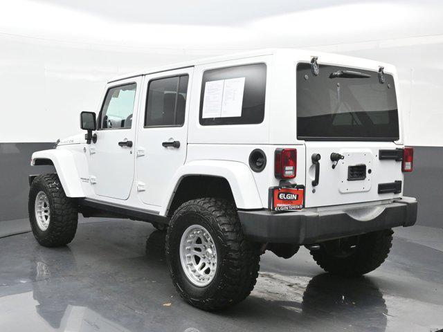 used 2014 Jeep Wrangler Unlimited car, priced at $22,990