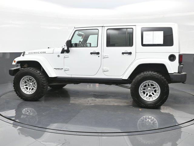 used 2014 Jeep Wrangler Unlimited car, priced at $22,990