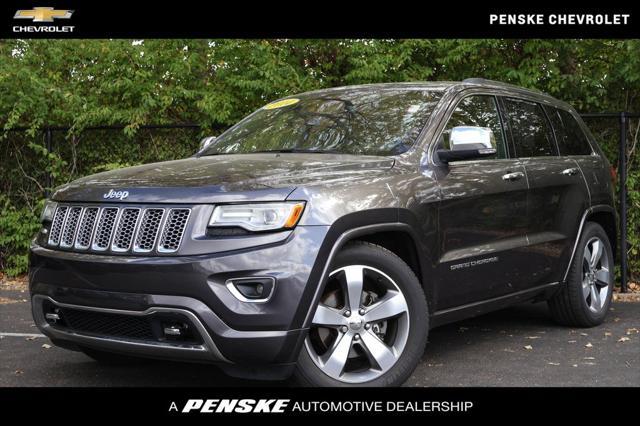 used 2014 Jeep Grand Cherokee car, priced at $13,003