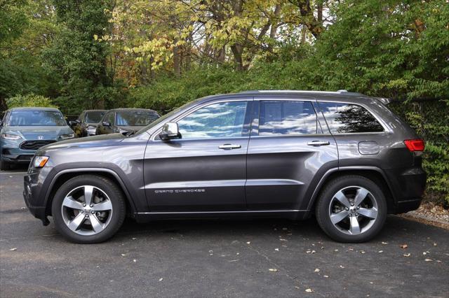 used 2014 Jeep Grand Cherokee car, priced at $13,003