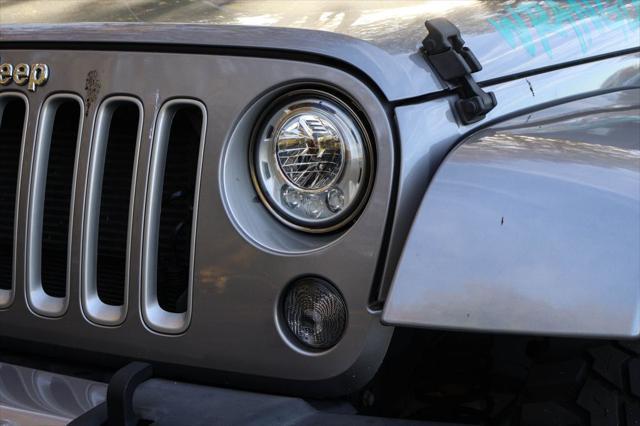 used 2017 Jeep Wrangler Unlimited car, priced at $25,092