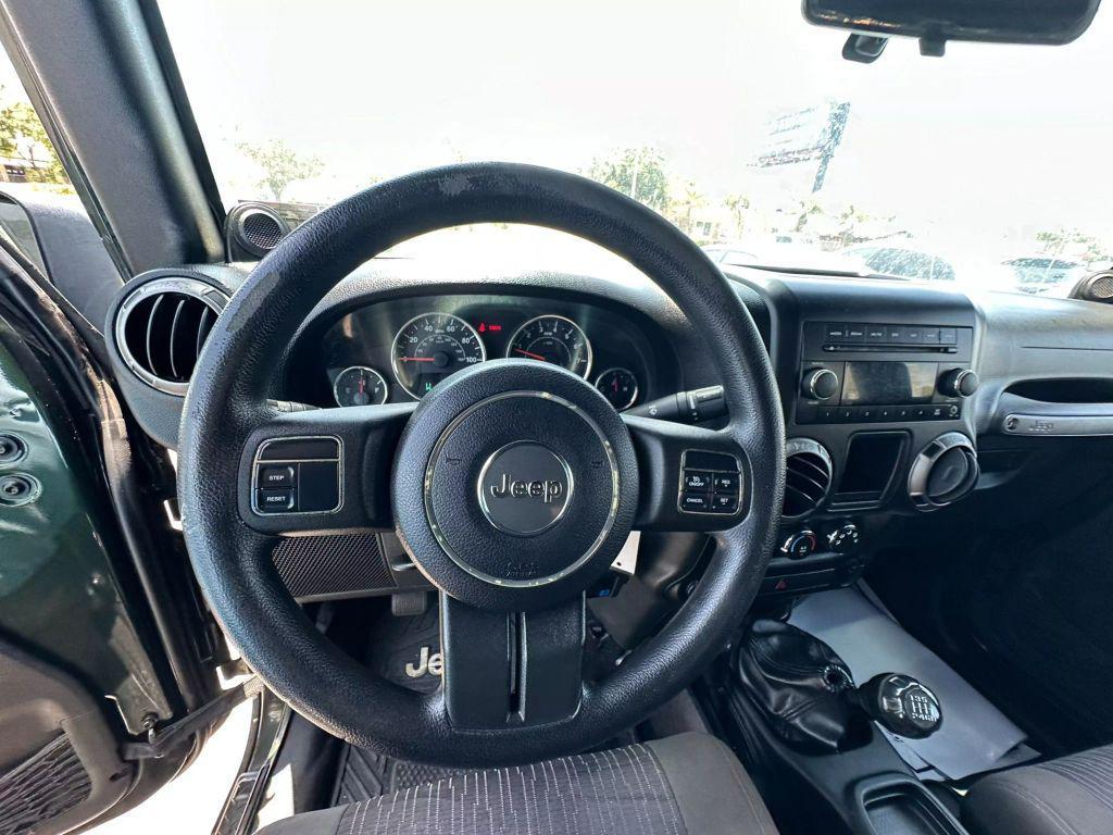 used 2011 Jeep Wrangler Unlimited car, priced at $9,995