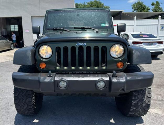 used 2011 Jeep Wrangler Unlimited car, priced at $9,995