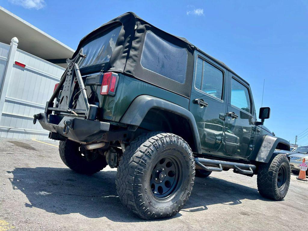 used 2011 Jeep Wrangler Unlimited car, priced at $9,995