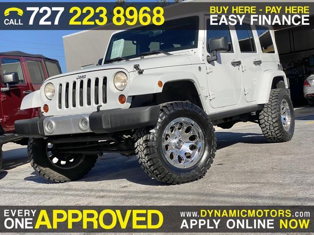 used 2011 Jeep Wrangler Unlimited car, priced at $17,855