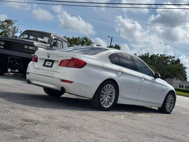 used 2014 BMW ActiveHybrid 5 car, priced at $10,995