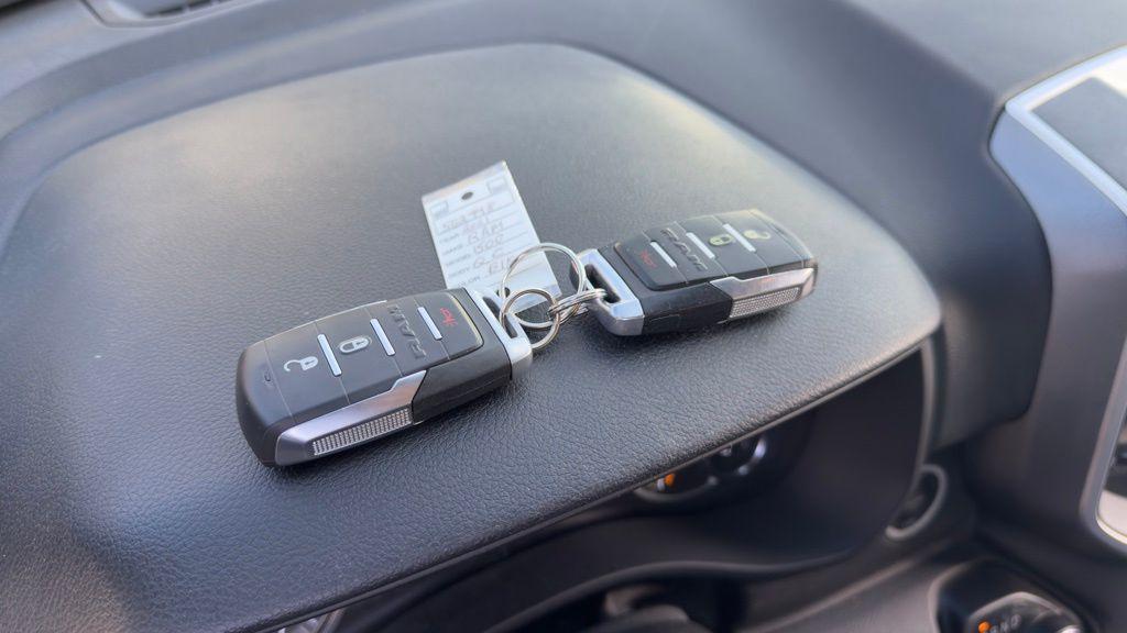 used 2021 Ram 1500 car, priced at $26,999