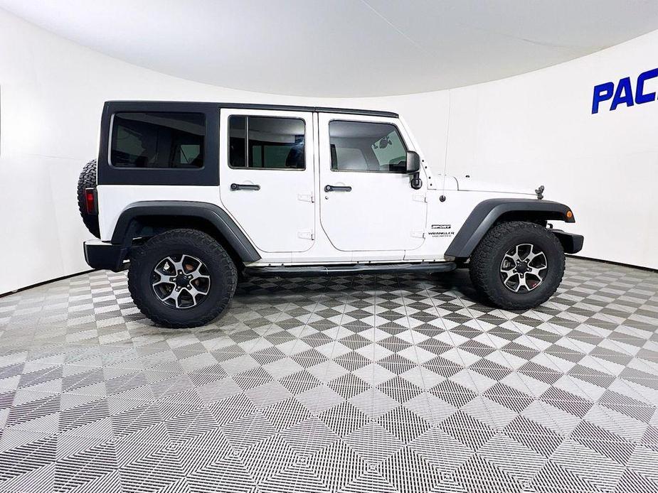 used 2014 Jeep Wrangler Unlimited car, priced at $17,299