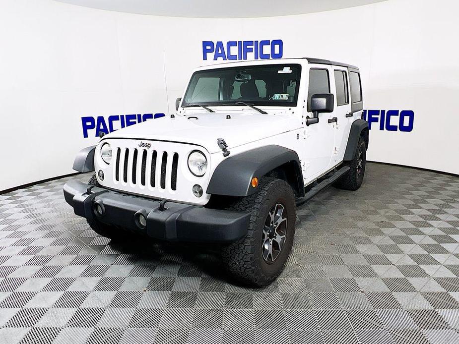 used 2014 Jeep Wrangler Unlimited car, priced at $17,299