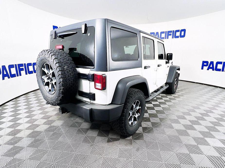 used 2014 Jeep Wrangler Unlimited car, priced at $17,299