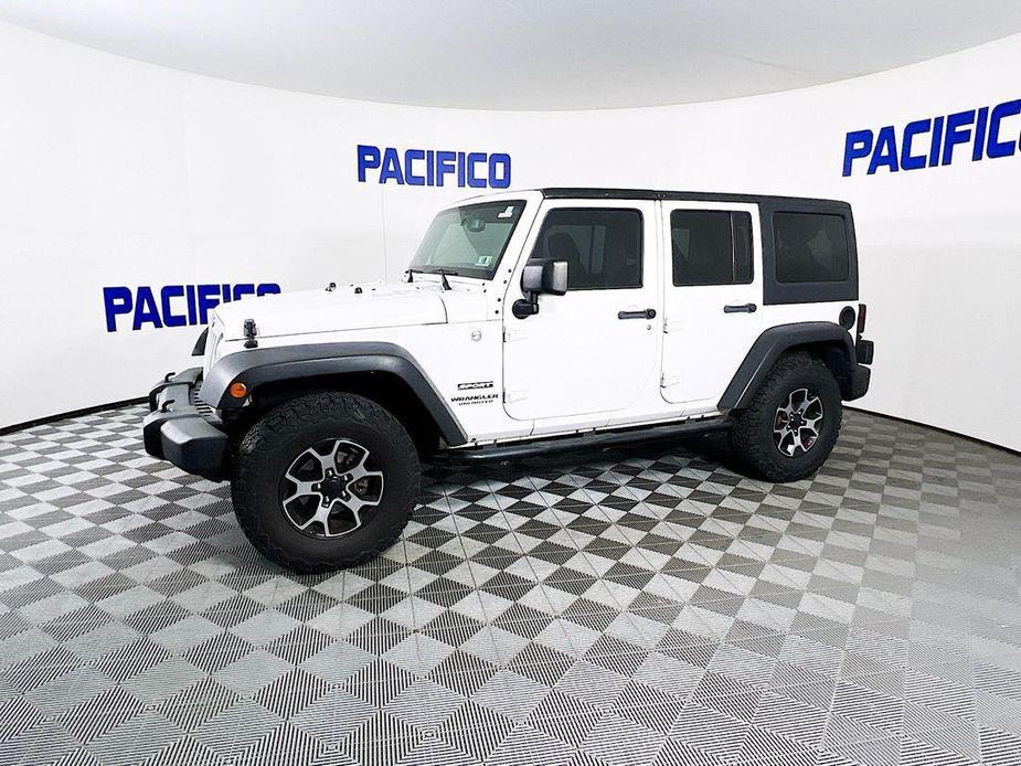 used 2014 Jeep Wrangler Unlimited car, priced at $17,299