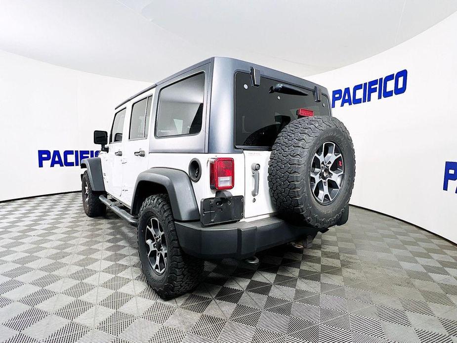 used 2014 Jeep Wrangler Unlimited car, priced at $17,299