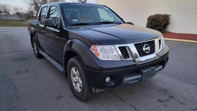 used 2013 Nissan Frontier car, priced at $14,995