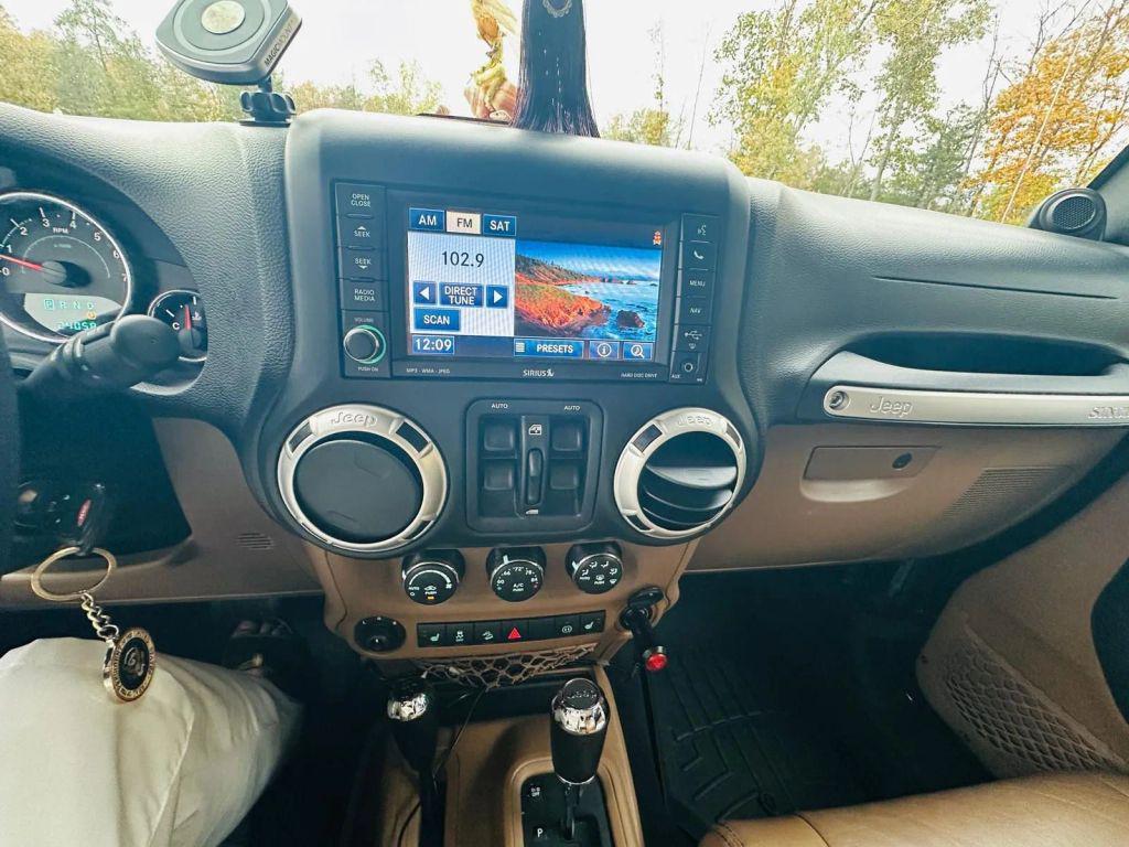 used 2011 Jeep Wrangler Unlimited car, priced at $19,600