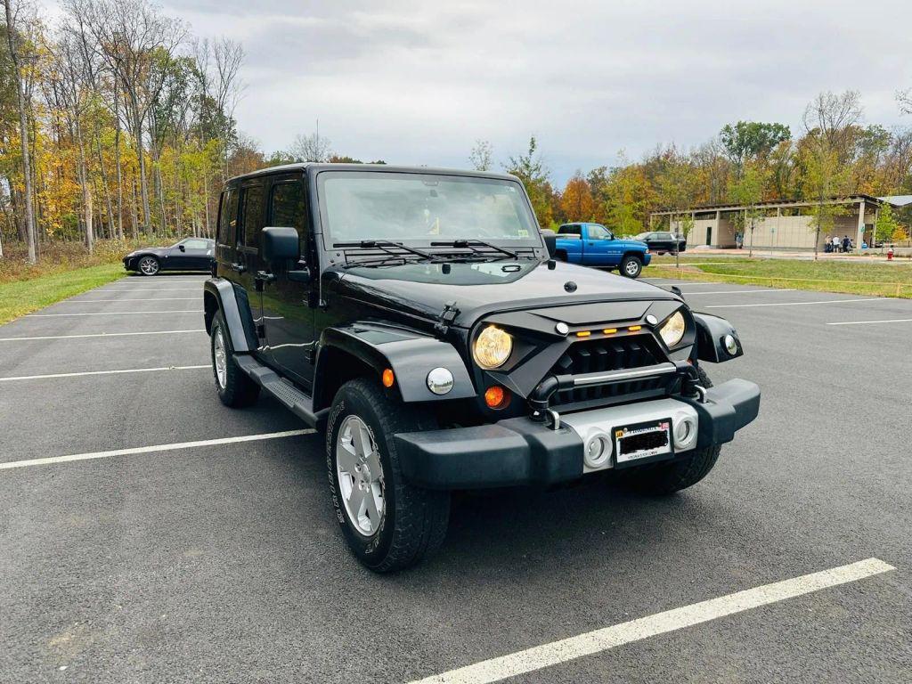used 2011 Jeep Wrangler Unlimited car, priced at $19,600