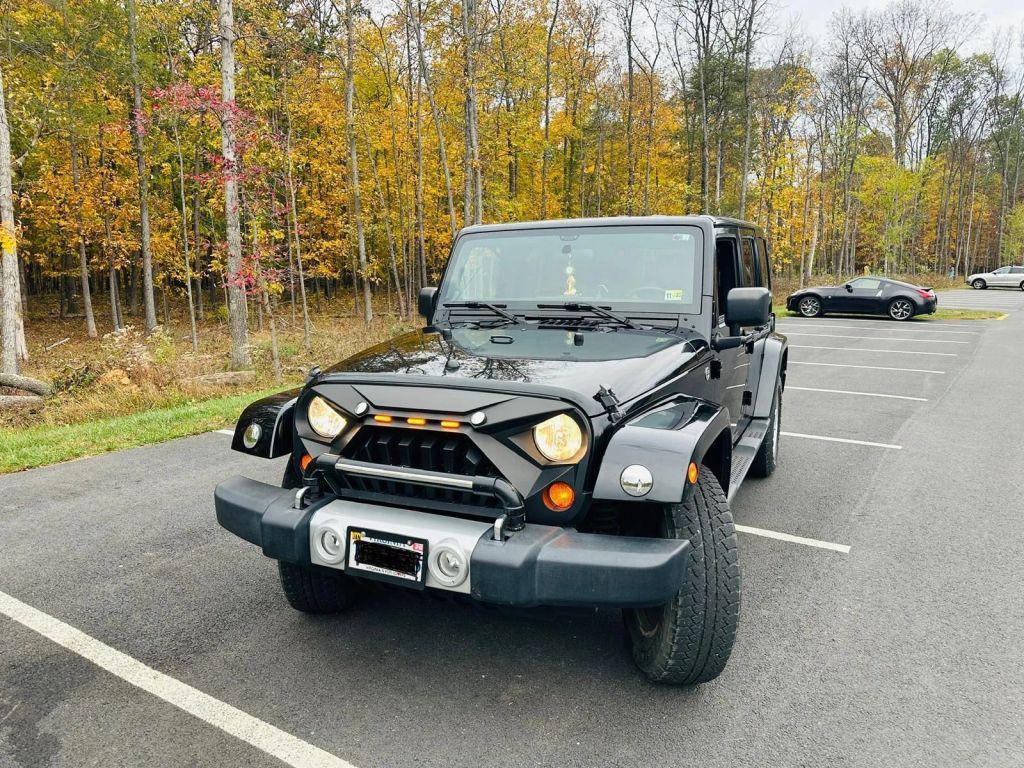 used 2011 Jeep Wrangler Unlimited car, priced at $19,600