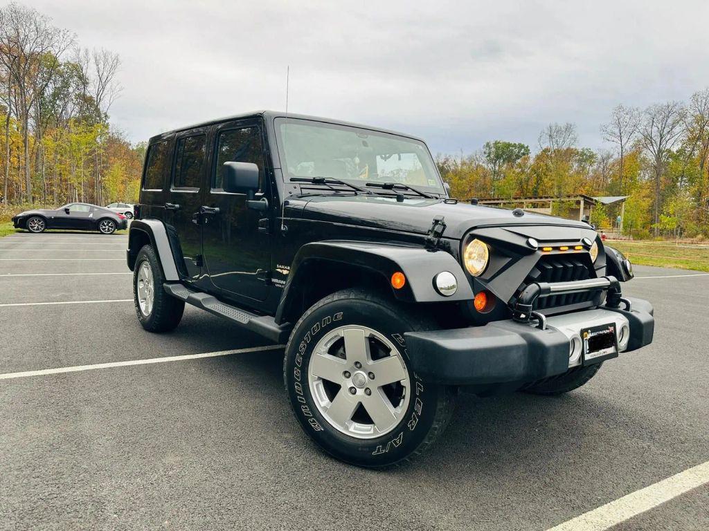 used 2011 Jeep Wrangler Unlimited car, priced at $19,600