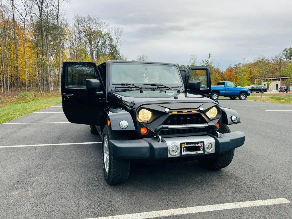 used 2011 Jeep Wrangler Unlimited car, priced at $19,600