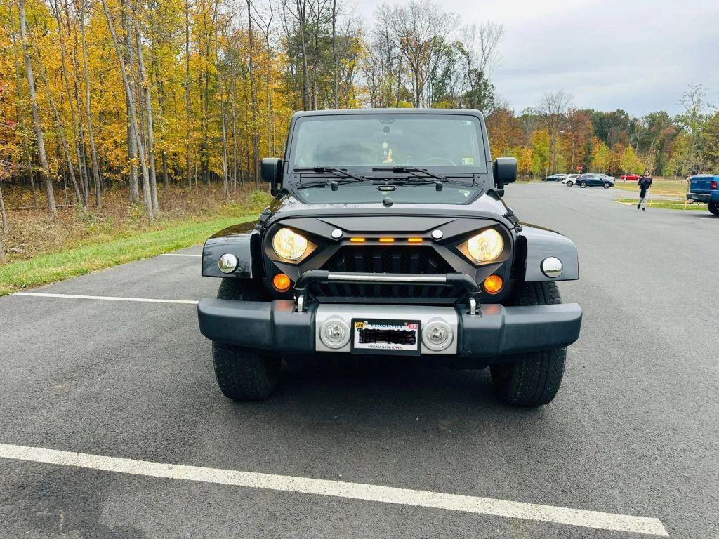 used 2011 Jeep Wrangler Unlimited car, priced at $19,600