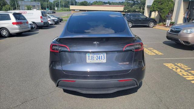 used 2024 Tesla Model Y car, priced at $34,600