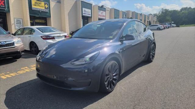 used 2024 Tesla Model Y car, priced at $34,600