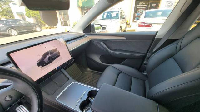 used 2024 Tesla Model Y car, priced at $34,600