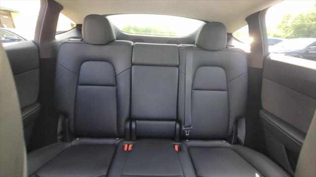 used 2024 Tesla Model Y car, priced at $34,600