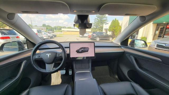 used 2024 Tesla Model Y car, priced at $34,600