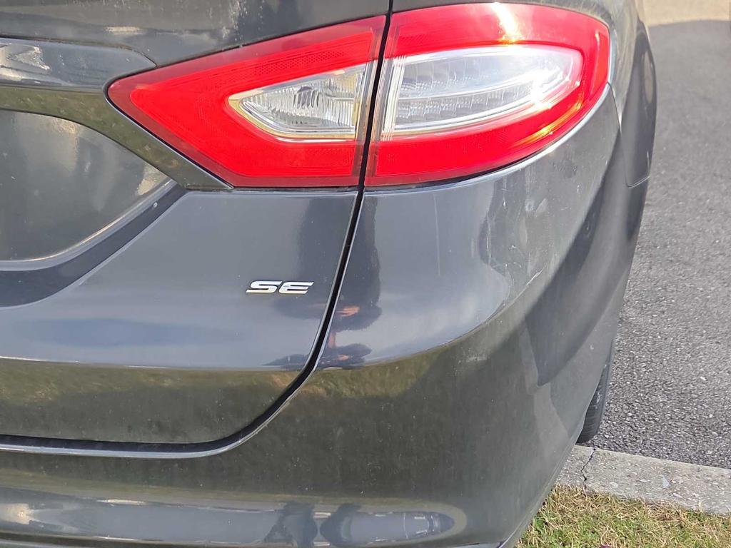 used 2014 Ford Fusion car, priced at $4,999