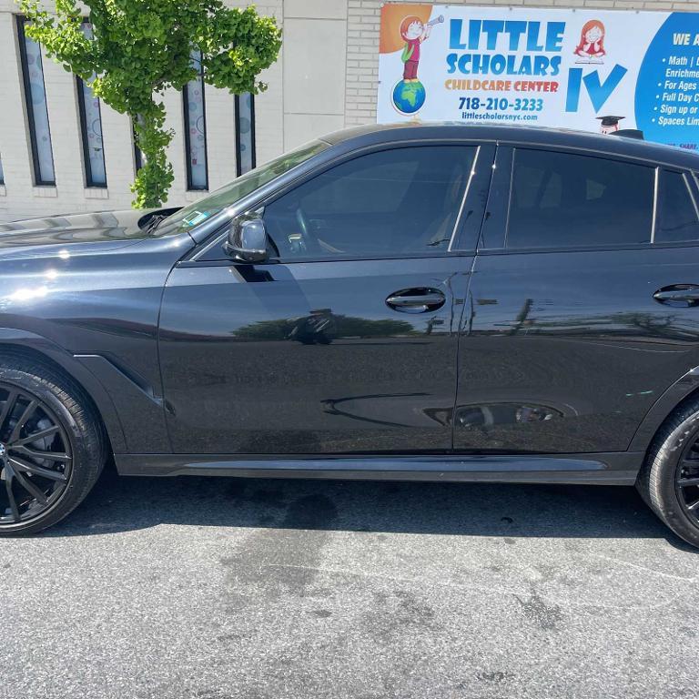 used 2022 BMW X6 car, priced at $59,551