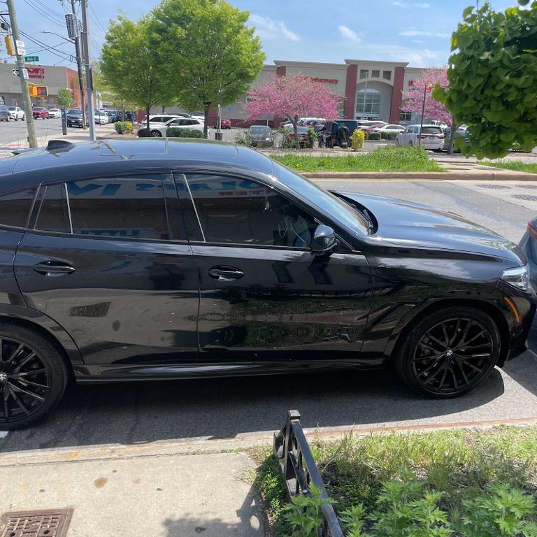 used 2022 BMW X6 car, priced at $59,551