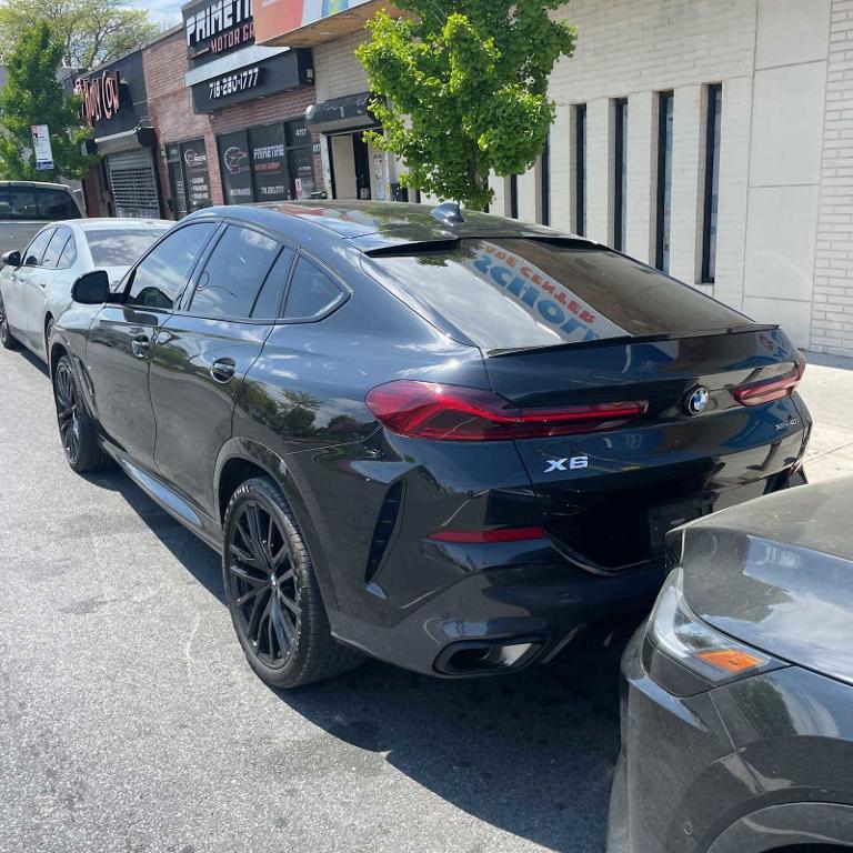 used 2022 BMW X6 car, priced at $59,551